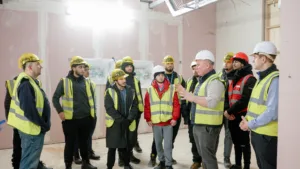 Picture of the collage students having a tour of the site.
